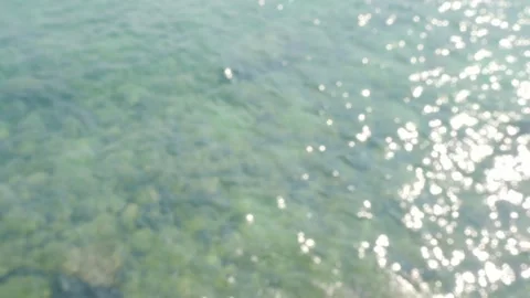 Blur bokeh wave sea texture background, effect overlay sun on ocean Stock Footage 338392573