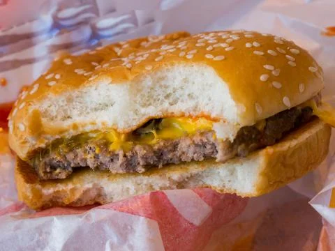 Blur of close up bited hamburger Stock Photos