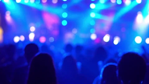 Blur crowd of people dancing on the dance floor of a night club light. blurry Stock Footage 265763253