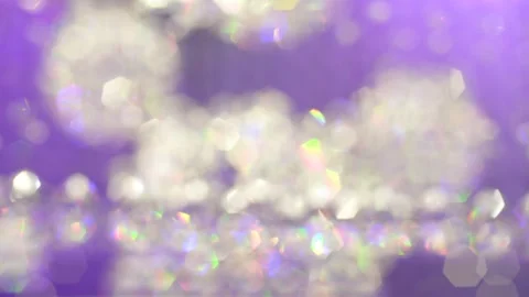 Blur crystal object that glitters in the purple or violet light background Stock Footage 153508018