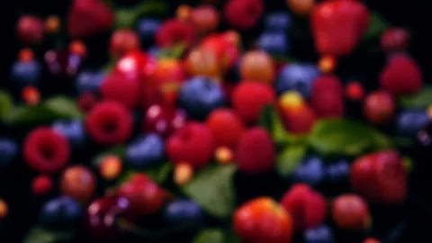 Blur decorative background with mixed fresh juicy berries and mint leaves 4K Видео 78506119
