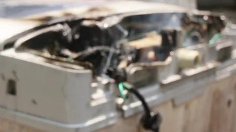 Blur defocus bokeh melted cable burned due to electrical short circuit Stock Footage 296781596