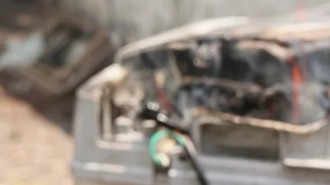 Blur defocus bokeh melted cable burned due to electrical short circuit Stock Footage 296781668