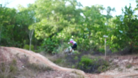 Blur defocus of cyclist ride mountain bike in forest for healthy and leisure  Stock Footage 131344397