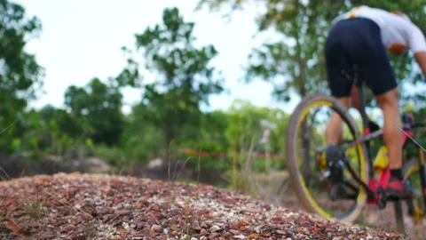 Blur defocus of cyclist ride mountain bike in forest for healthy and leisure  Stock Footage 131344645