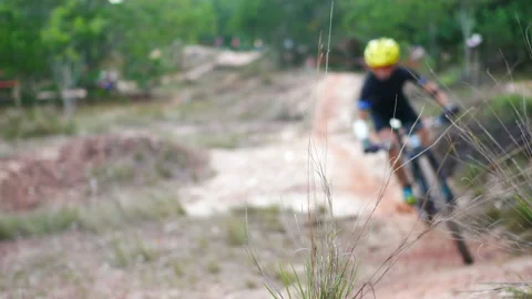Blur defocus of cyclist ride mountain bike in forest for healthy and leisure  Stock Footage 131345100
