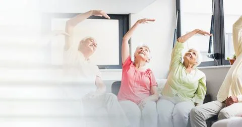 Blur effect with copy space against group of caucasian senior people dancing Foto stock