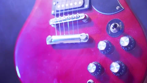 Blur effect on the knobs of a guitar. 스톡 동영상 309363414