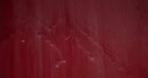 Blur falling paint liquid ink flow drops smoke Video stock 303843032