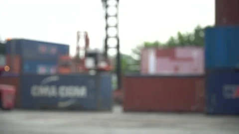 Blur of forklift lifting up and moving container box at warehouse logistic in Stock Footage 154691207
