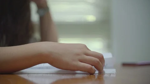 Blur hands reading a book in public library Video stock 128788935