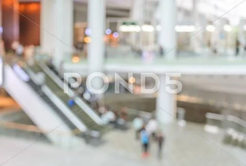 Blur image of escalators at the modern shopping mall Stock Photos