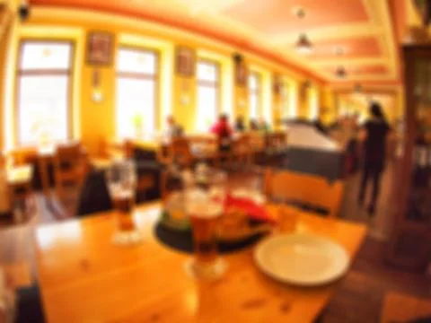 Blur interior of the restaurant with large windows Stock Photos