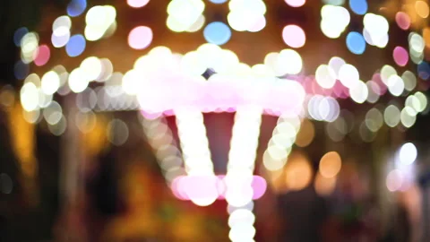 Blur kid playing on Carousel and bokeh of light at night. Stock Footage 135763201