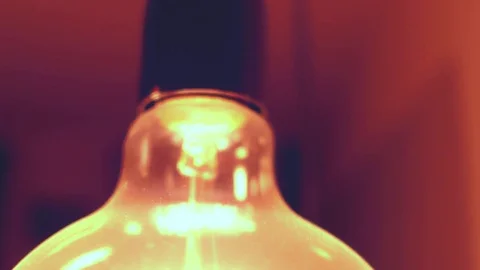 Blur light bulbs illuminates dark room Stock Footage 72710029