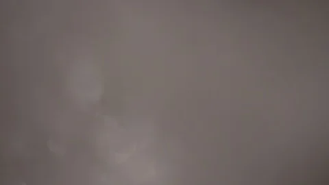 Blur melting snowflakes under the microscope Stock Footage 105744299