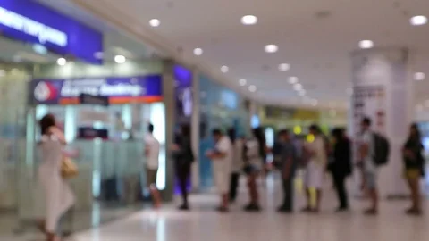 Blur or Defocus Background of People line up to use Banking Machine or ATM Stock Footage 95771950
