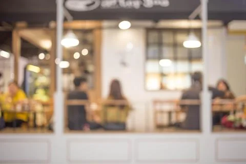 Blur or Defocus image of Coffee Shop or Cafeteria for use as Background Stock Photos
