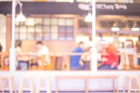 Blur or Defocus image of Coffee Shop or Cafeteria for use as Background Stock Photos