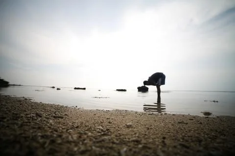 Blur of people playing on the beach Foto stock