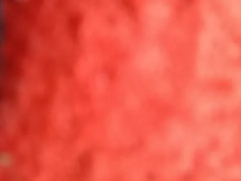 Blur red background, textile material Stock Photos