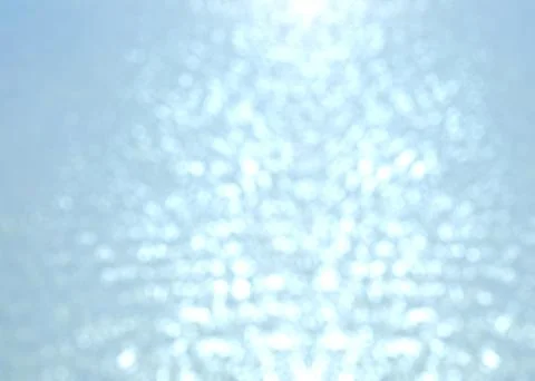 Blur reflection of sunlight on water background. Stock Illustration