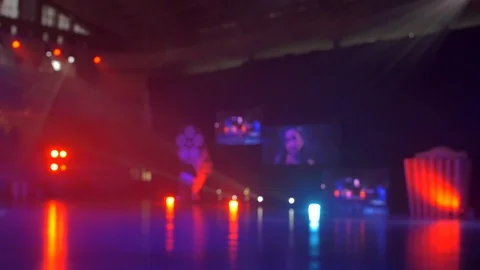 Blur scene of arena being shine by colorful spotlight during concert Stock Footage 113132810