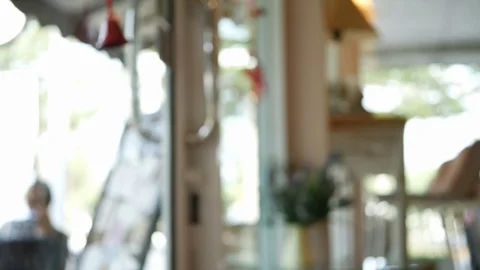 Blur scene in cafe interior decorated with glass door and window Stock Footage 89775792
