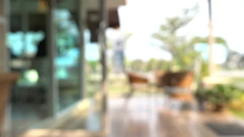 Blur scene outdoor cafe with table seat outside garden view in the morning Stock Footage 146958298