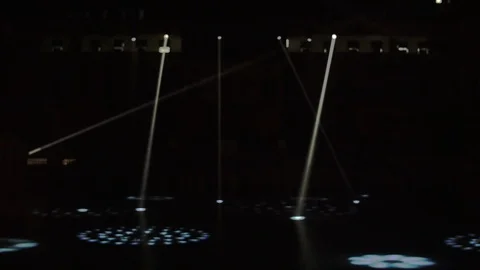 Blur scene of white spotlight shining in dark stadium during night Video stock 113132398