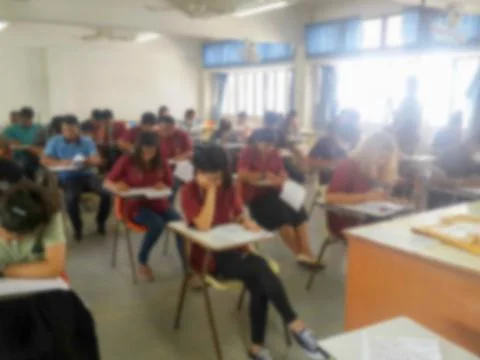 Blur school or university students writing answer Stock Photos