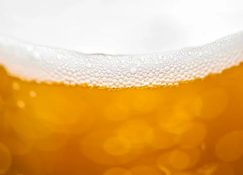 Blured beer background with bubbles Stock Photos