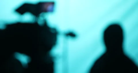 Blured Cameramen silhouette Stock Footage 335693075