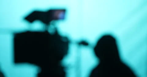 Blured Cameramen silhouette Stock Footage 335693191