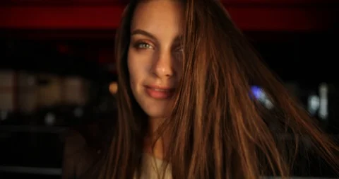 Blured effect. Close up shooting of attractive smiled woman with beautiful green Stock Footage 124688412