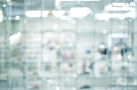 Blured modern bokeh inside technology lab shelf and white room Stock Photos