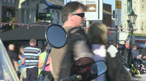 Blured motorbikes passing by - back of heads Stock Footage 36805481