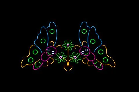 Blured Multi-colored neon lights at night. Stock Photos