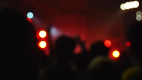 Blured of some cheering fans dancing in a free live concert in music festival Stock Footage 95720589