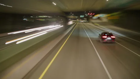 Blured streaks of light from fast moving time lapse on street Stock Footage 235467150