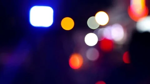 Blurred abstract background, and a flashing light. Evening road, traffic Video stock 78750187