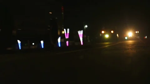 Blurred abstract background, and a flashing light. Evening road, traffic Stock Footage 92118548