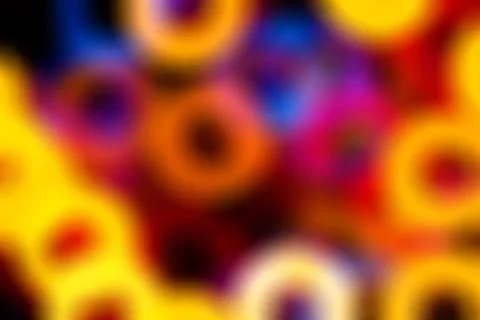 Blurred abstract background with colored rings Stock Illustration