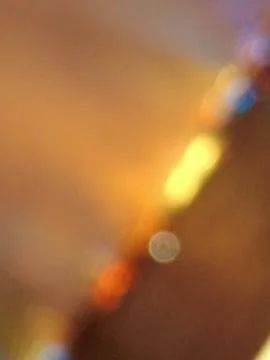 Blurred, abstract background, diagonal flowing shades of yellow, gold, brown Stock Photos