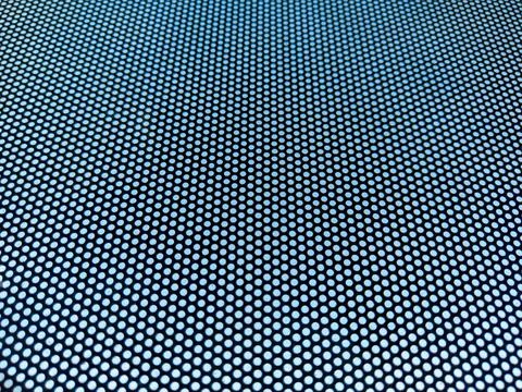 Blurred abstract background perforated pattern with moire effect Stock Photos