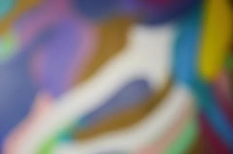Blurred abstract background. Smooth transitions of yellow, blue, and crimso.. Stock Photos
