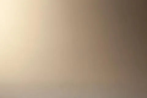 Blurred abstract background for your design. Light beige gradient. Foto stock