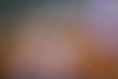 Blurred abstract gradient background with soft lighting for creative design.. Stock Photos