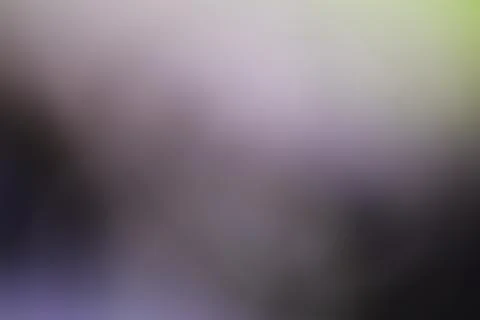 Blurred abstract gradient background with soft lighting for creative design.. Stock Photos