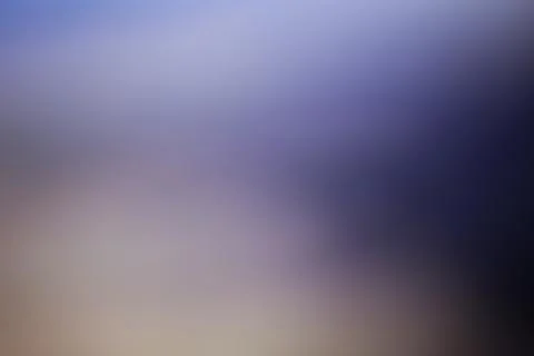 Blurred abstract gradient background with soft lighting for creative design.. Stock Photos